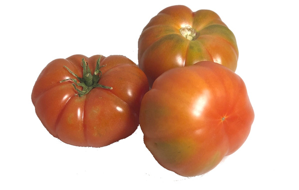 KI generiert: Drei geriffelte Tomaten auf weißem Hintergrund.
