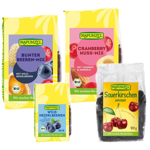 KI generiert: Verschiedene Packungen mit getrockneten Früchten und Nuss-Mix von Rapunzel. Text: "Rapunzel, BIO".